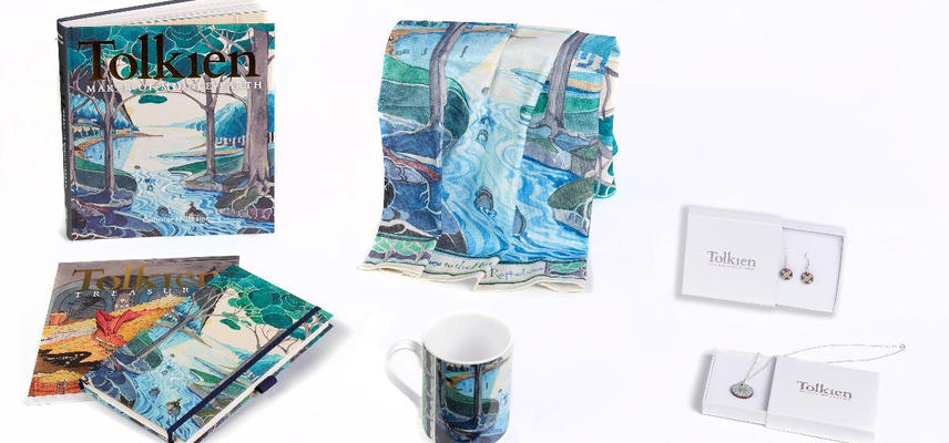 A range of products decorated in Tolkein illustrations: a book, a notepad, a scarf and a mug