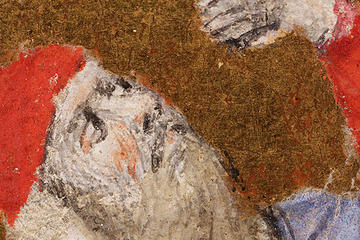A section of a painting showing a man wearing a red hat